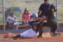 Foothill’s Adrienne Higgins (21) slides home for an out against Green Valley’s A ...