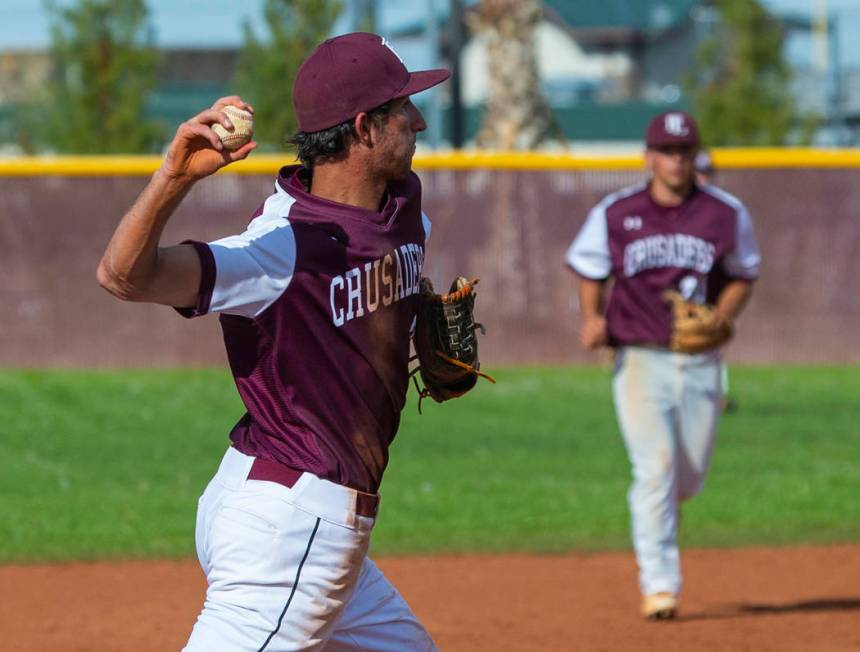 Faith Lutheran’s Michael Rice (2) looks to first base on a throw versus Palo Verde dur ...