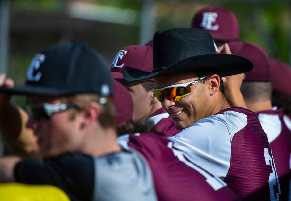 Faith Lutheran’s Frank Pagano (24) sports a cowboy hat in their dugout versus Palo Ver ...