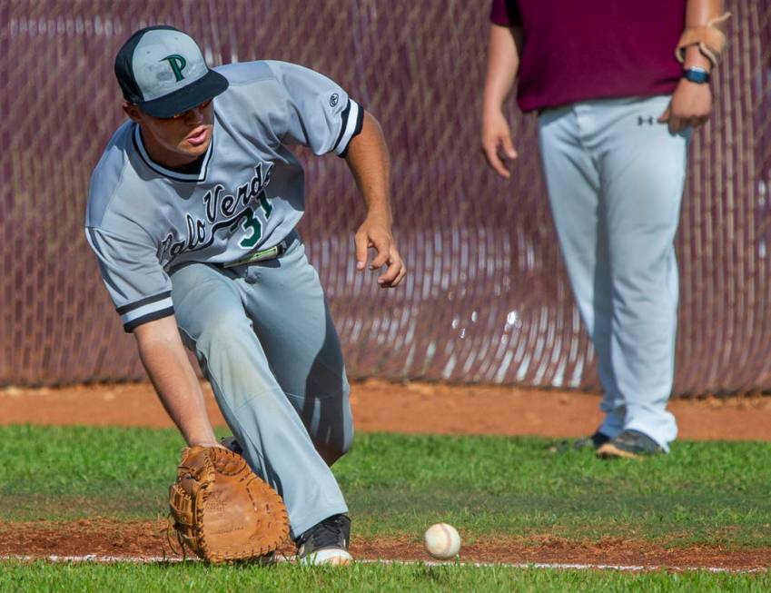 Palo Verde’s Austin Raleigh (31) looks to a grounder from a Faith Lutheran batter duri ...