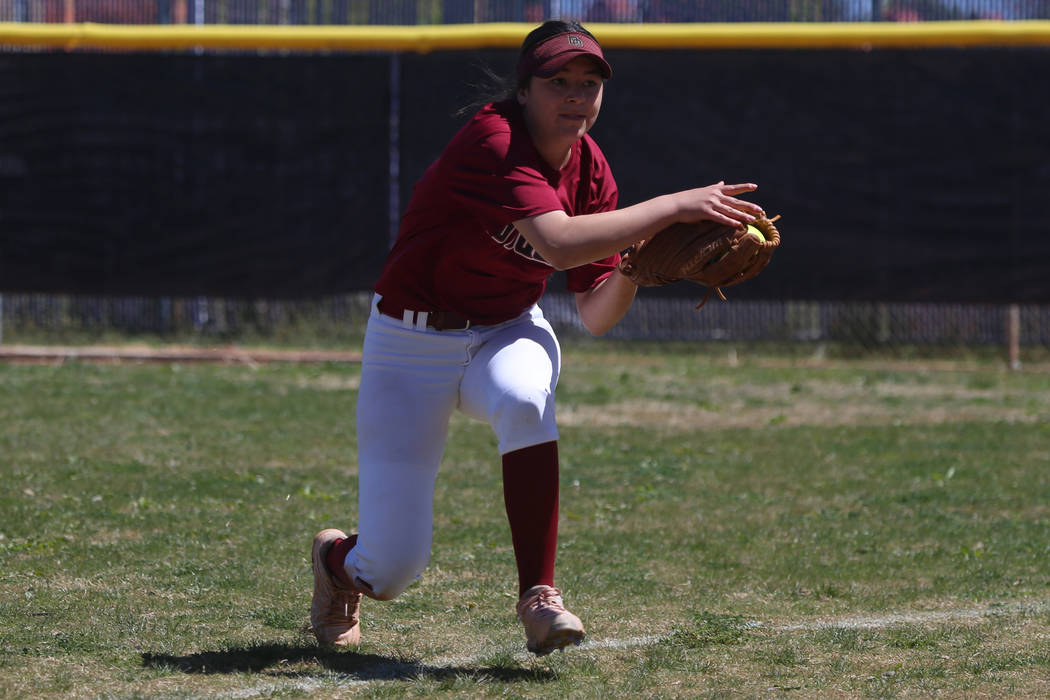 Desert Oasis Ruby Martinez (10) makes a catch in the outfield for an out against Rancho in t ...