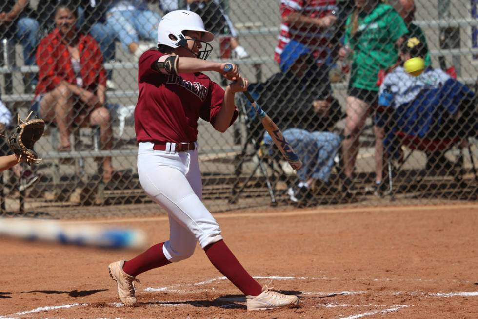 Desert Oasis Ruby Martinez (10) hits the ball for a single against Rancho in the softball ga ...