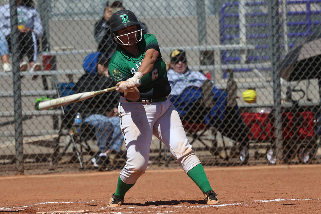 Rancho’s Liliana Gutierrez (6) hits the ball for a solo homer against Desert Oasis in ...