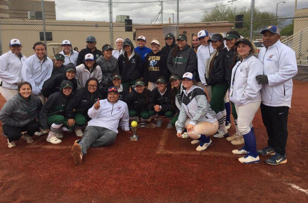 Members of the Sierra Vista and Schurr (California) softball teams pose for a group photo af ...