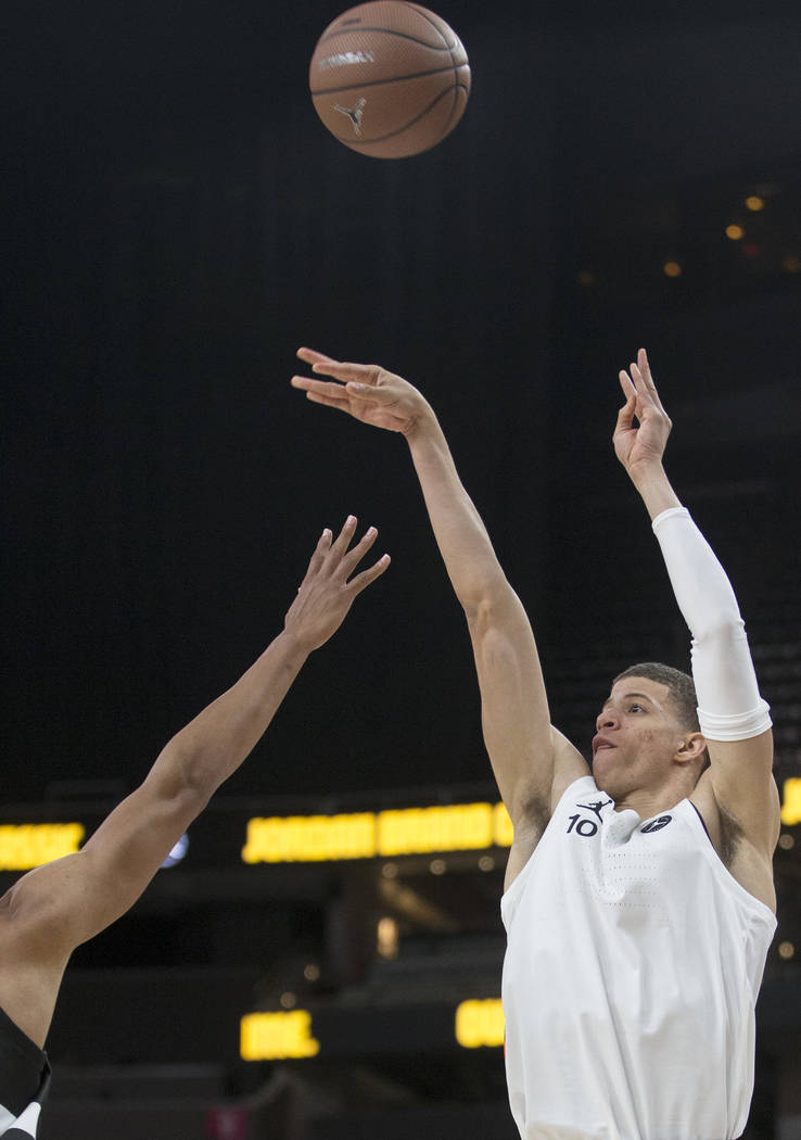 Samuell Williamson (10) shoots a corner three in the second half during the Jordan Brand Cla ...