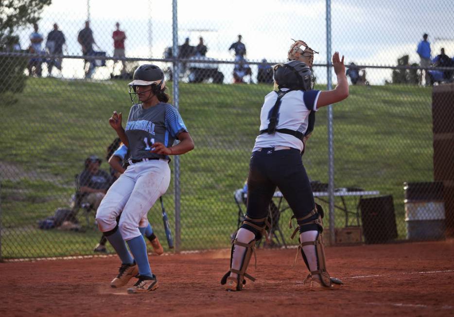 Centennial High School’s Jacqueline Perez Mena (11) makes home base against Shadow Rid ...