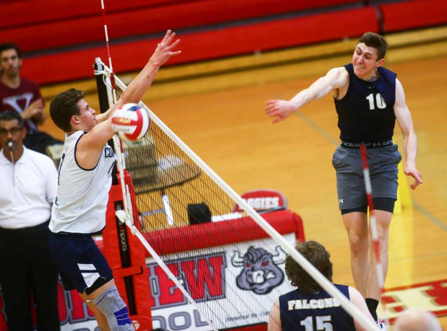 Foothill’s Caleb Stearman (10) spikes the ball past Coronado’s Jacob Ceci (7) du ...