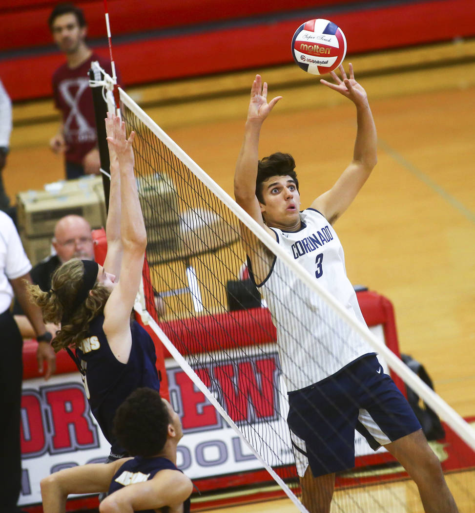 Coronado’s Alex White (3) sets the ball for a teammate during the Desert Region tourna ...