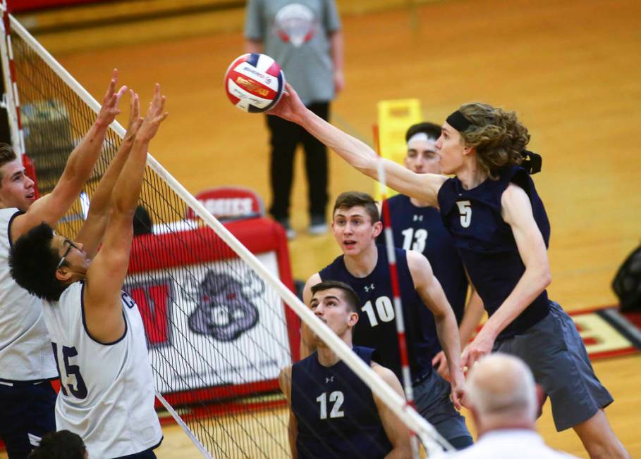 Foothill’s Brock Weaver (5) sends the ball past Coronado’s Justin Fan (15) durin ...