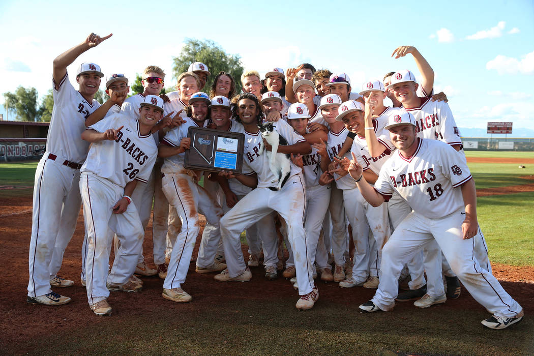 Desert Oasis pose for a photo after their win against Basic in the Desert Region championshi ...