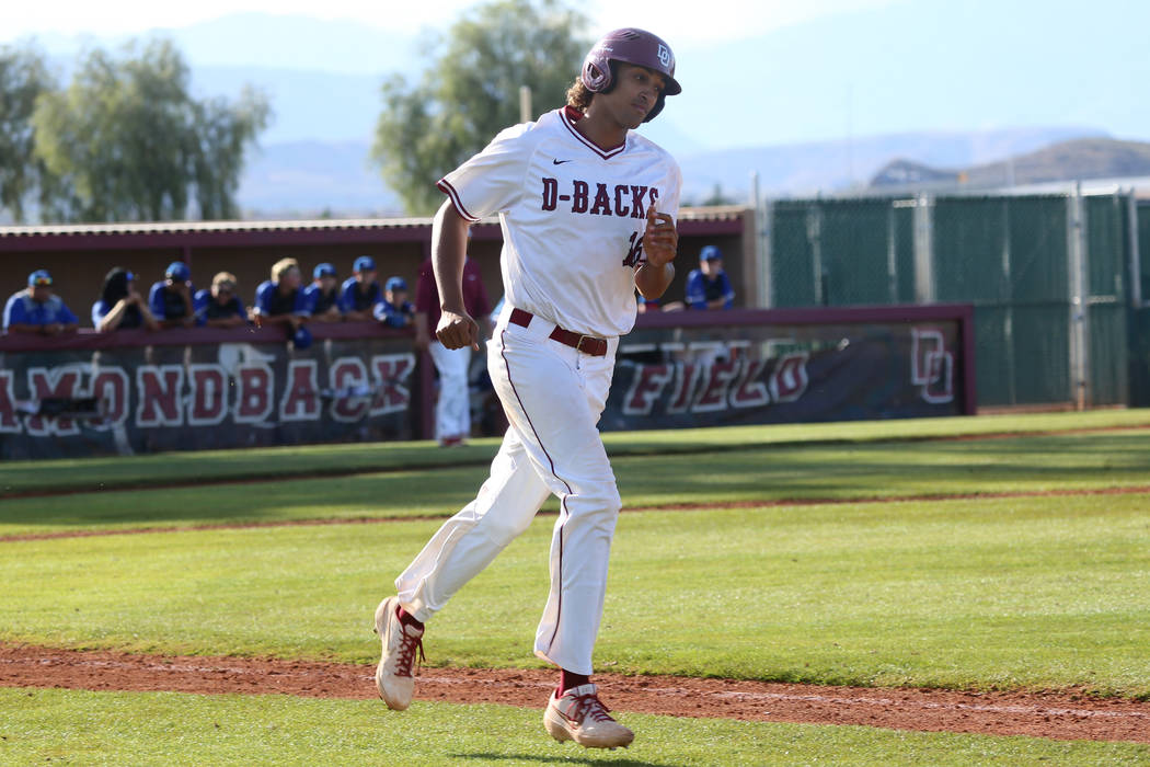 Desert Oasis’ Campbell Holt (16) runs the bases after hitting a two run homer against ...