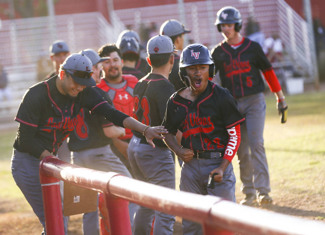 Las Vegas’ Layne Adaro (22) celebrates his run against Arbor View during a baseball ga ...