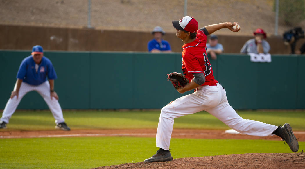 Las Vegas pitcher Nathan Freimuth (12) winds up for a throw versus Reno during their state b ...