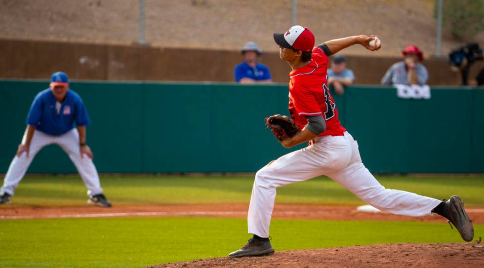 Las Vegas pitcher Nathan Freimuth (12) winds up for a throw versus Reno during their state b ...