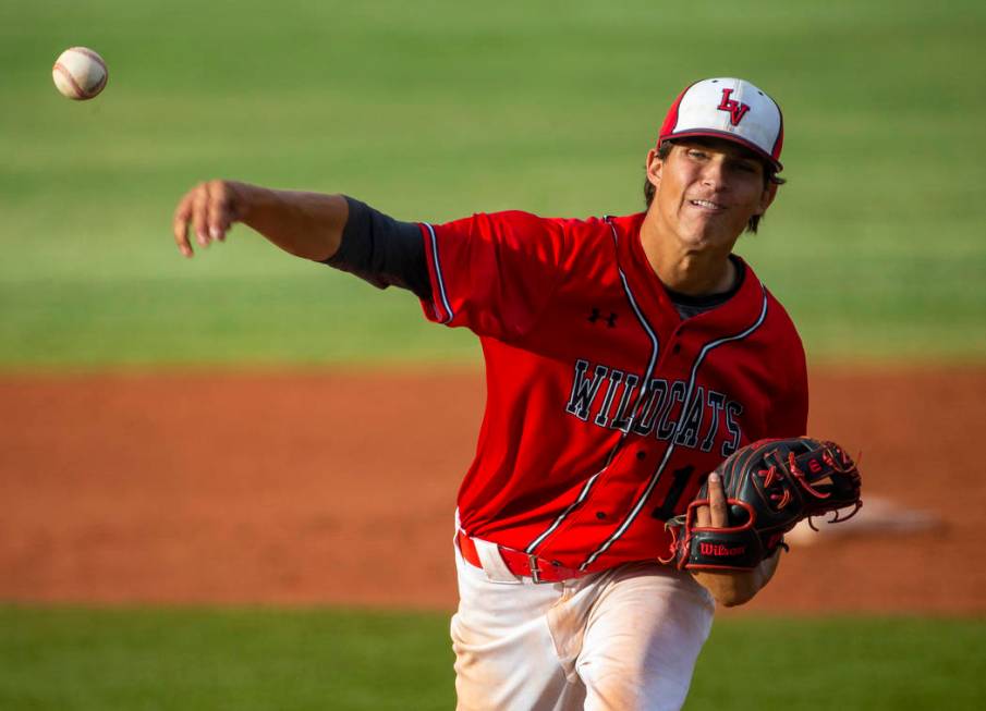 Las Vegas pitcher Nathan Freimuth (12) releases a throw versus Reno during their state baseb ...