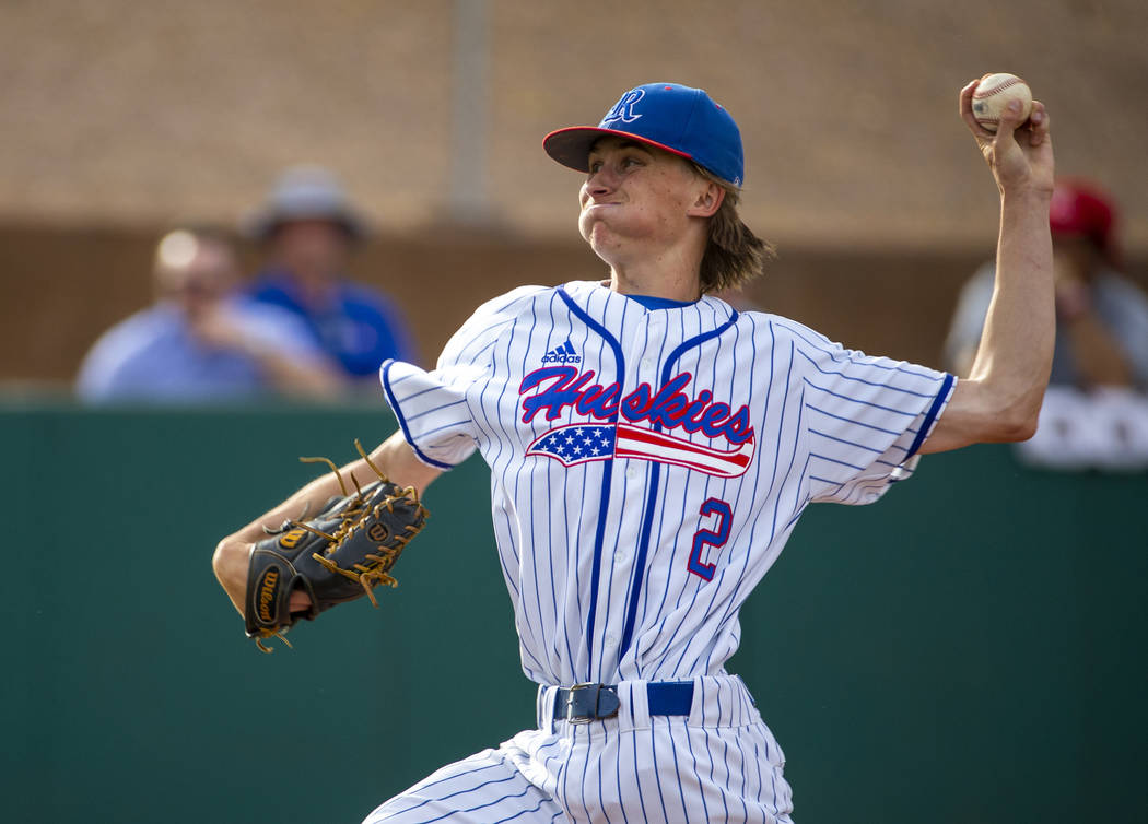 Reno pitcher John Barry (2) winds up for another throw versus Las Vegas during their state b ...