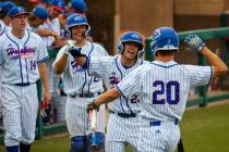 Reno players celebrate a score by teammate Coleman Schmidt (20) versus Las Vegas during thei ...