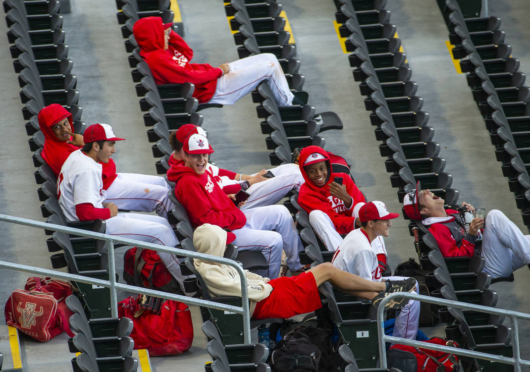 Arbor View players share some laughs in the stands before their game versus Las Vegas during ...