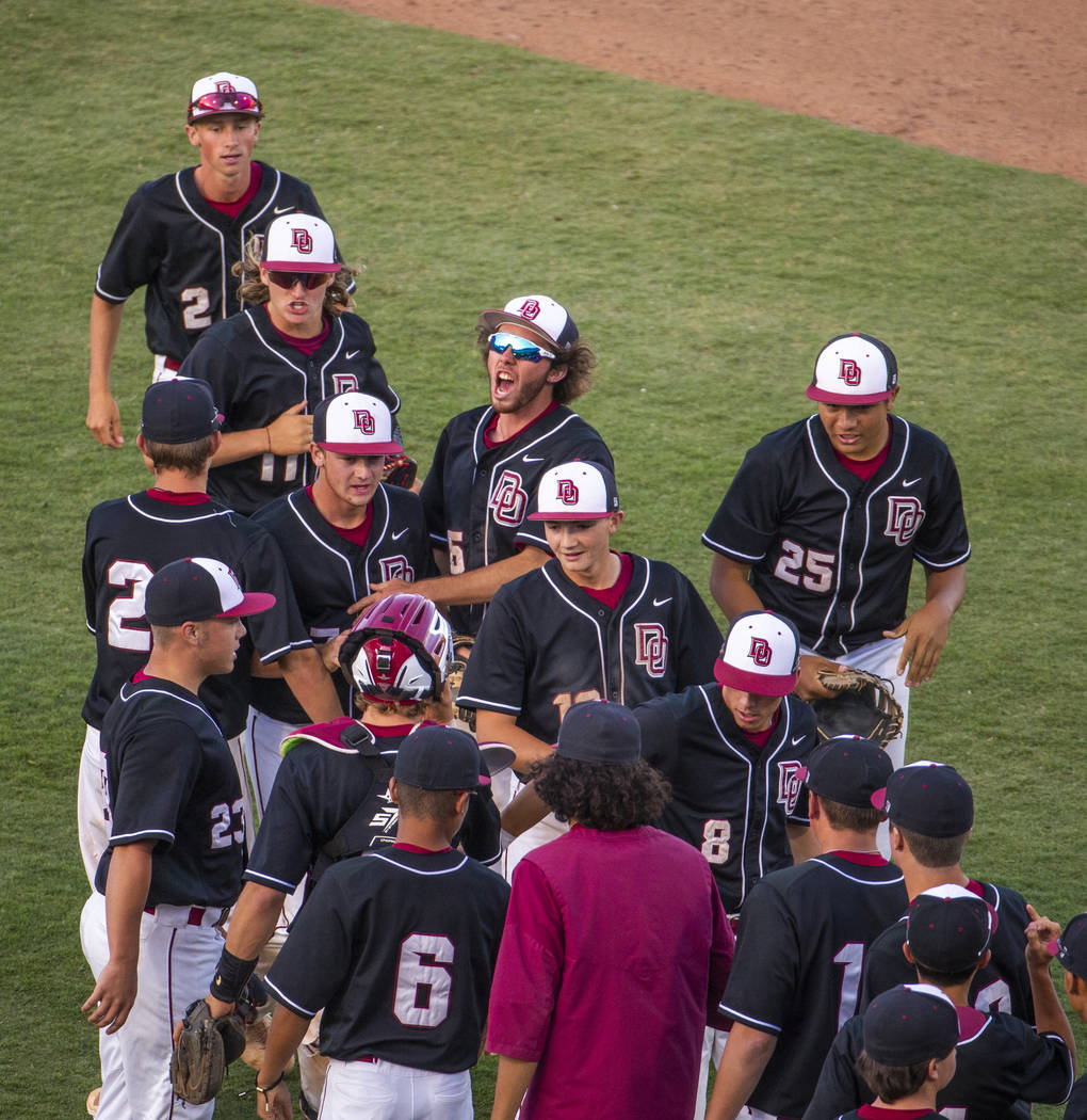 Desert Oasis players celebrate their win over Reno 8-6 following their Class 4A state baseba ...