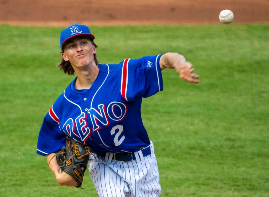 Reno pitcher John Barry (2) first a throw to a Desert Oasis batter in the first inning durin ...