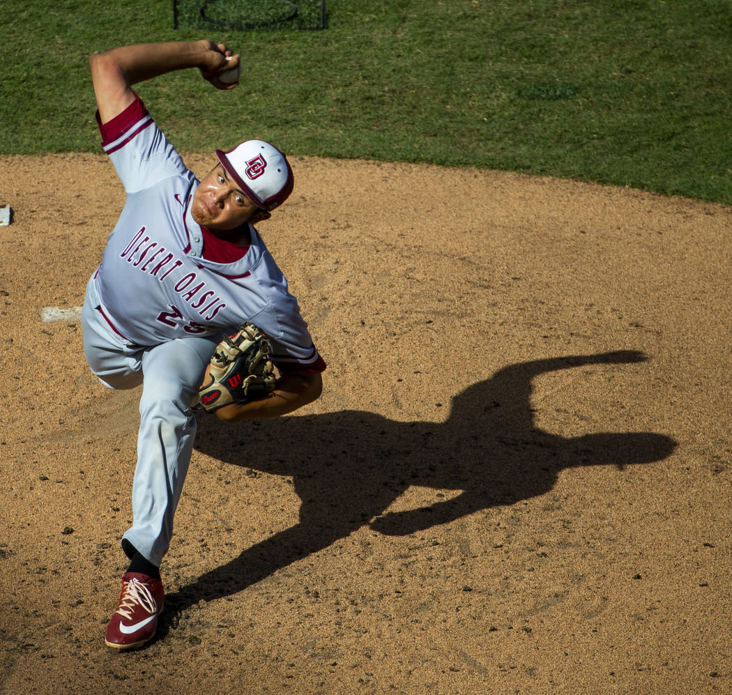 Desert Oasis pitcher Aaron Roberts (25) winds up for another throw versus Reno in the second ...