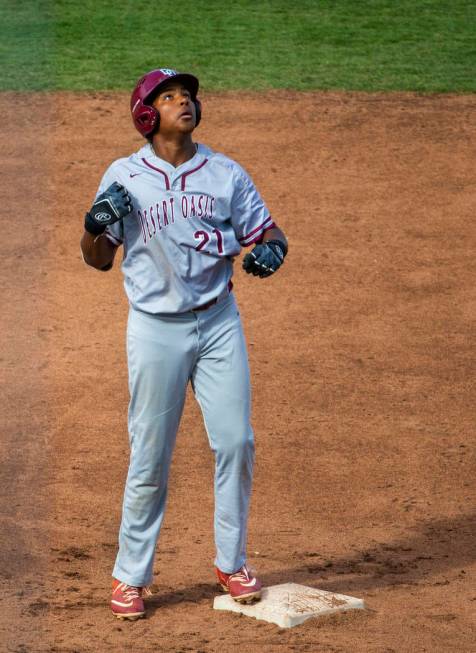 Desert Oasis runner Jacob Walsh (21) looks up at second base versus Reno in the second innin ...