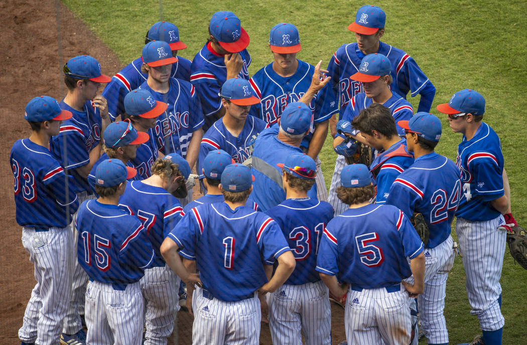 Reno head coach Pete Savage brings his team together for a talk versus Desert Oasis in the s ...