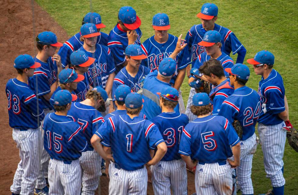 Reno head coach Pete Savage brings his team together for a talk versus Desert Oasis in the s ...