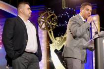 Raul Saldivar, left, and Leo Saucedo accept an award at the 2019 National Academy of Television ...