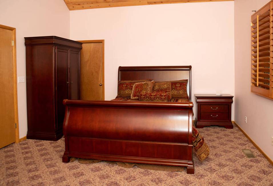 One of two bedrooms in the cabin. (Tonya Harvey Real Estate Millions)