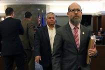 Former Henderson Constable Earl Mitchell, left, leaves the courtroom with his attorney David Fi ...