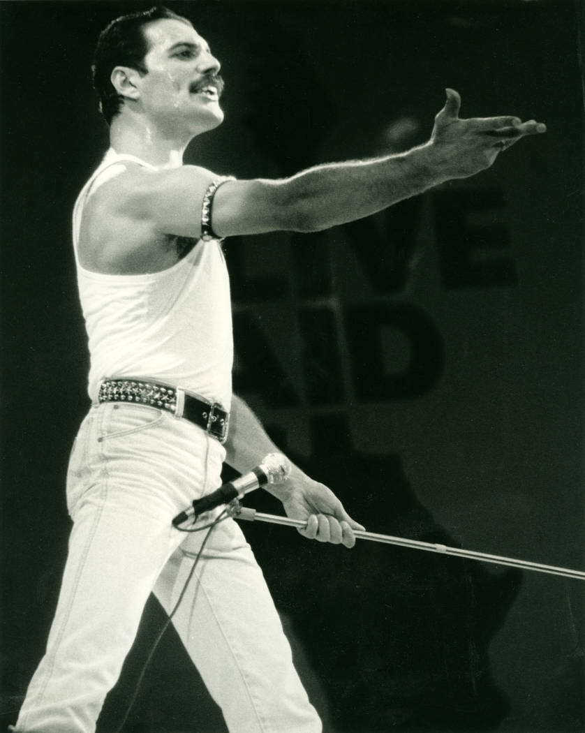 Freddy Mercury with Queen on stage at Live Aid on 13 July 1985 at Wembley Stadium, London. (AP ...
