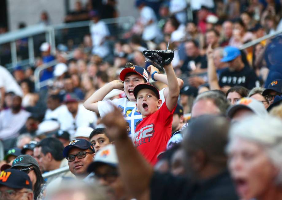 Las Vegas Aviators fans cheer as the team plays against Round Rock Express in "Reyes de Pl ...