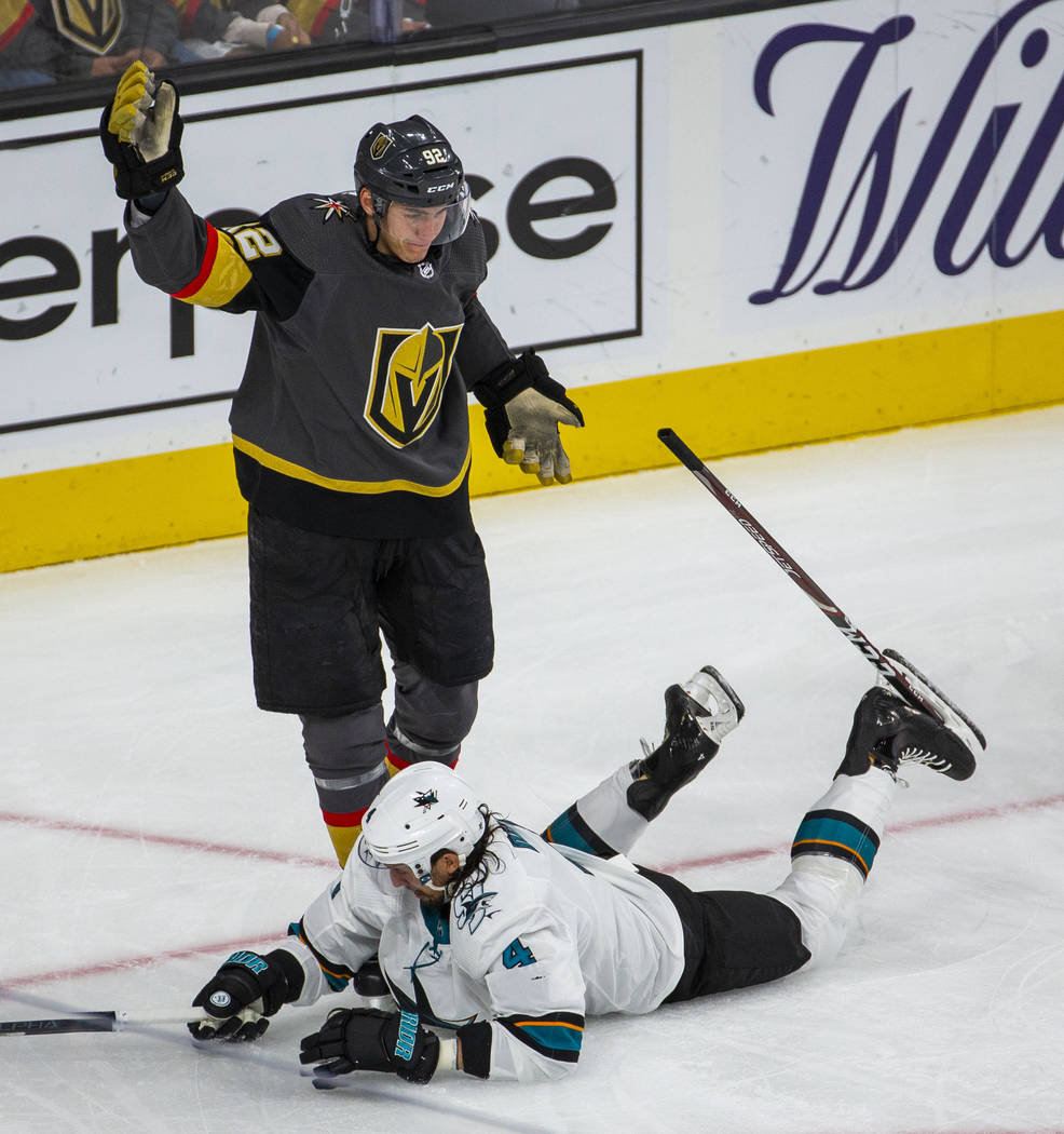 Golden Knights left wing Tomas Nosek (92) has his stick stuck in the skate of San Jose Sharks d ...