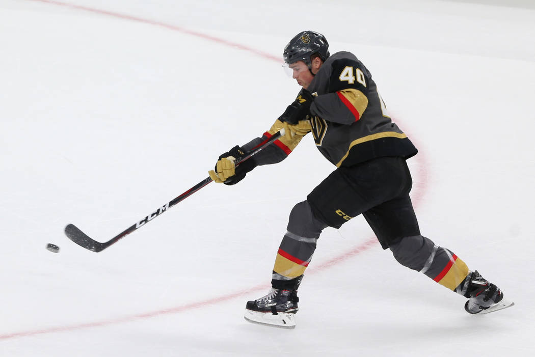 Vegas Golden Knights center Ryan Carpenter (40) takes a shot for a miss against the Detroit Red ...