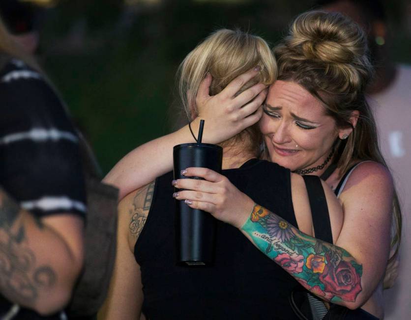 Friends and family mourn Max Garcia during a vigil for the Las Vegas man on Monday, July 1, 201 ...