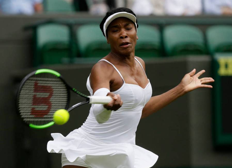 United States's Venus Williams returns to United States' Cori "Coco" Gauff in a Women ...