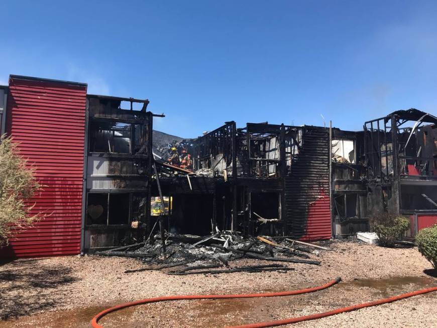 The Clark County and Las Vegas fire departments are fighting a fire at an apartment complex at ...