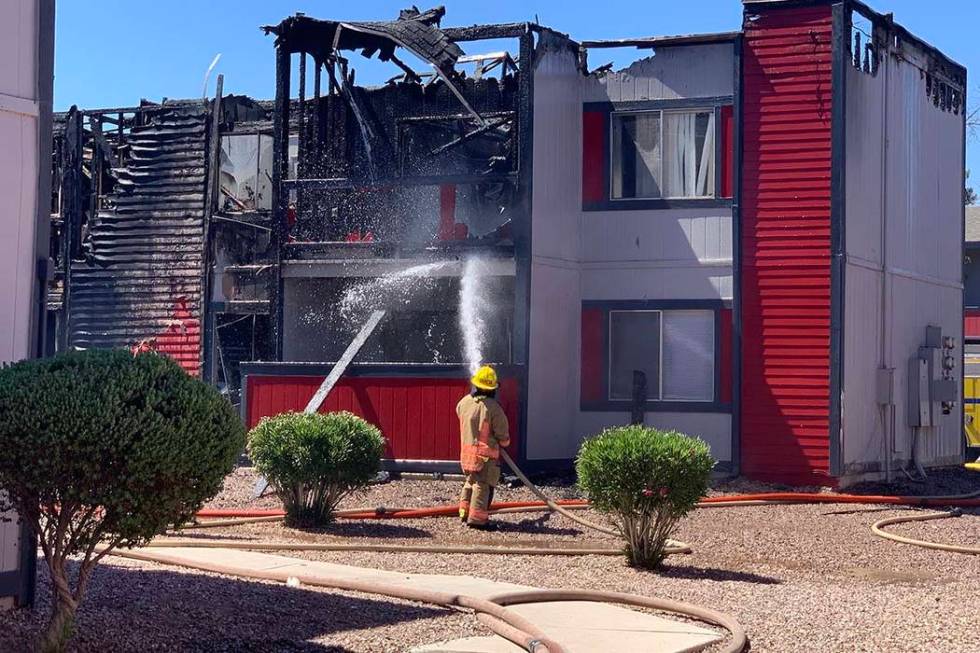 The Clark County and Las Vegas fire departments are fighting a fire at an apartment complex at ...