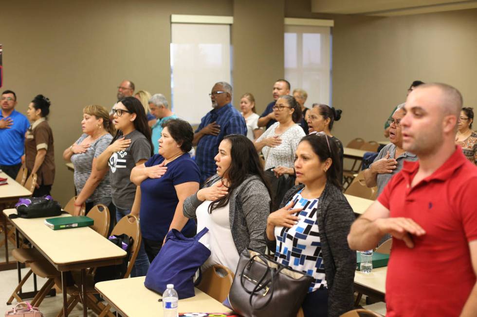 Students including Walter Salguero, originally from Guatemala, right, and Adriana Bolanos, thir ...