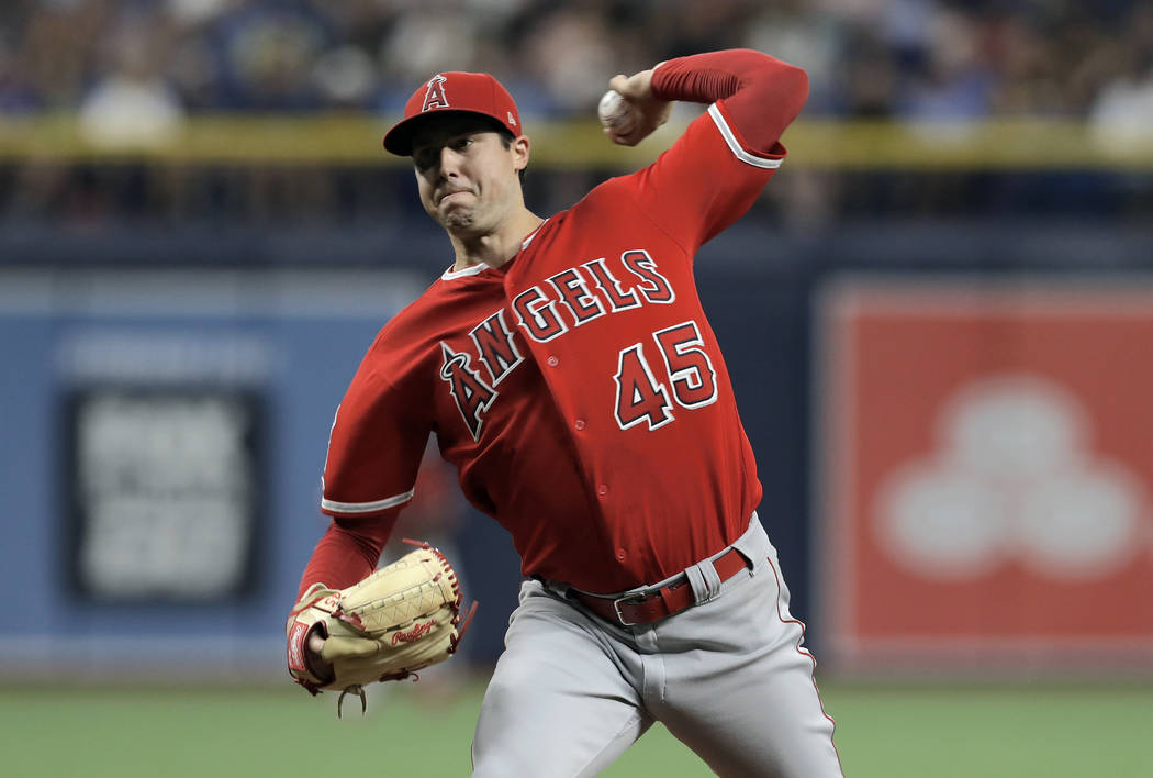 In this June 13, 2019 file photo Los Angeles Angels' Tyler Skaggs pitches to the Tampa Bay Rays ...