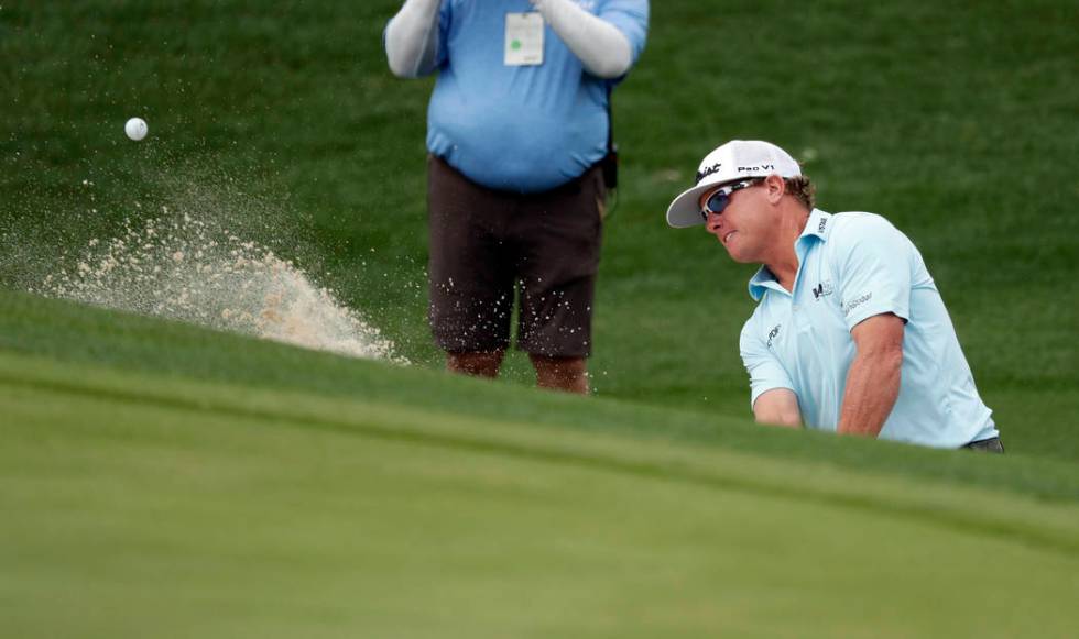 Charley Hoffman plays a shot from a bunker on the second hole during the final round of the Tex ...