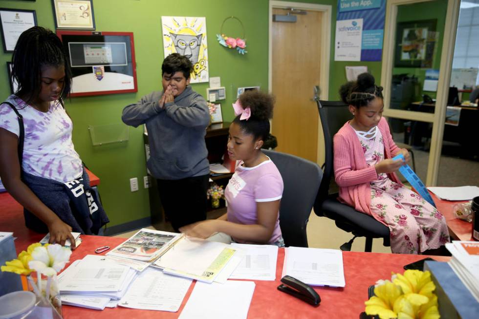 Cherish Bell, 12, from left, Jairo Ramirez, 11, Zariyah West, 12, and Rachel Conner, 10, prepar ...