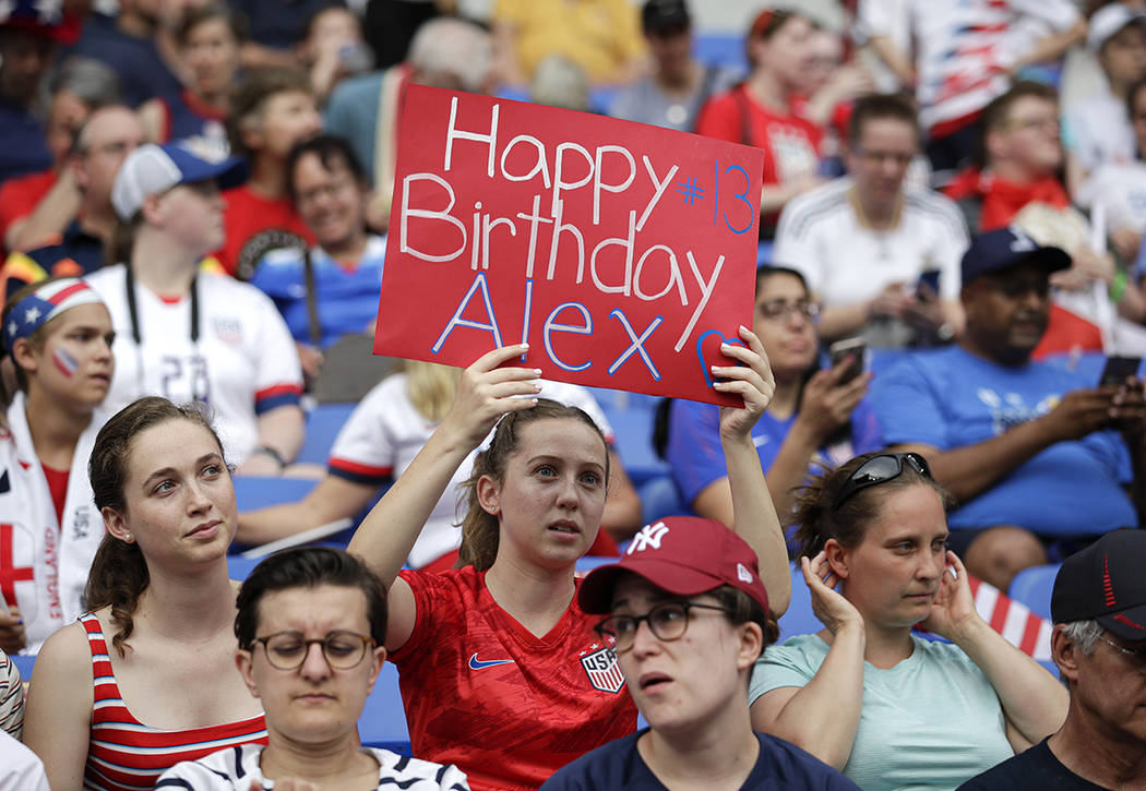 A United States's fan holds a birthday wish banner for United States' Alex Morgan before the Wo ...