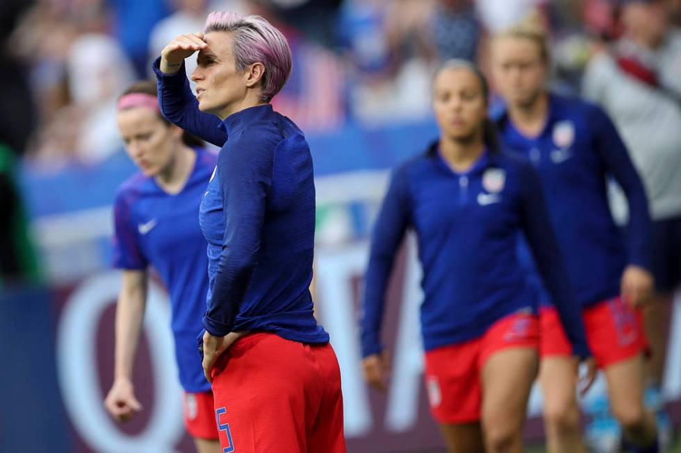 United States' Megan Rapinoe watches teammates warm up before the Women's World Cup semifinal s ...