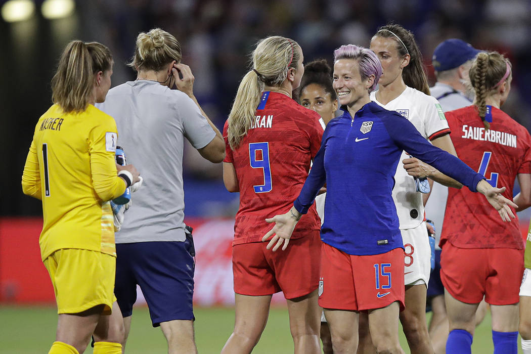 United States' Megan Rapinoe prepares to hug United States goalkeeper Alyssa Naeher after the W ...