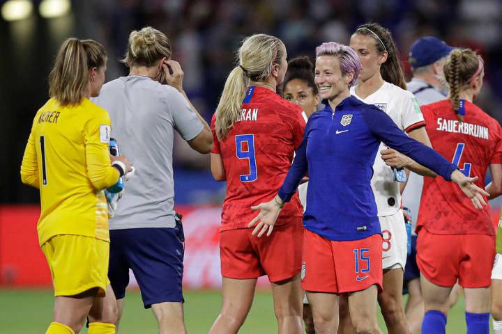 United States' Megan Rapinoe prepares to hug United States goalkeeper Alyssa Naeher after the W ...