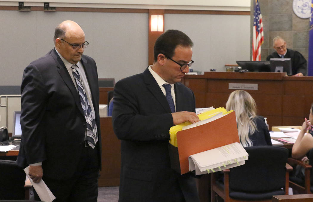 Michael Paglia, left, and his attorney Richard Schonfeld leave the courtroom at the Regional Ju ...