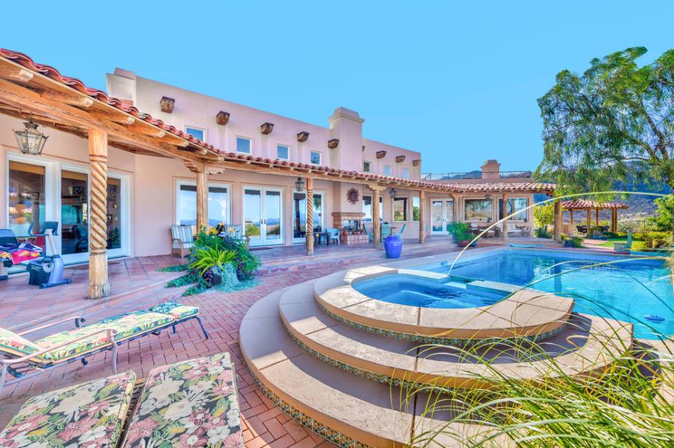 The backyard features a pool and spa. (Desert Sun Realty)