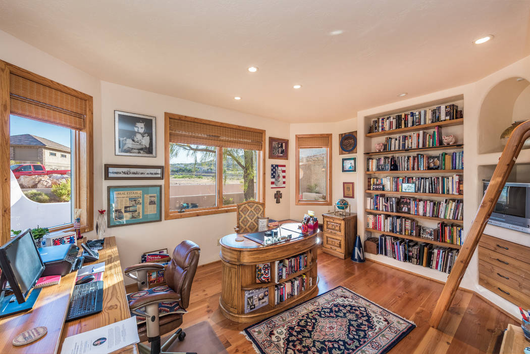 The office has plenty of library space. (Desert Sun Realty)